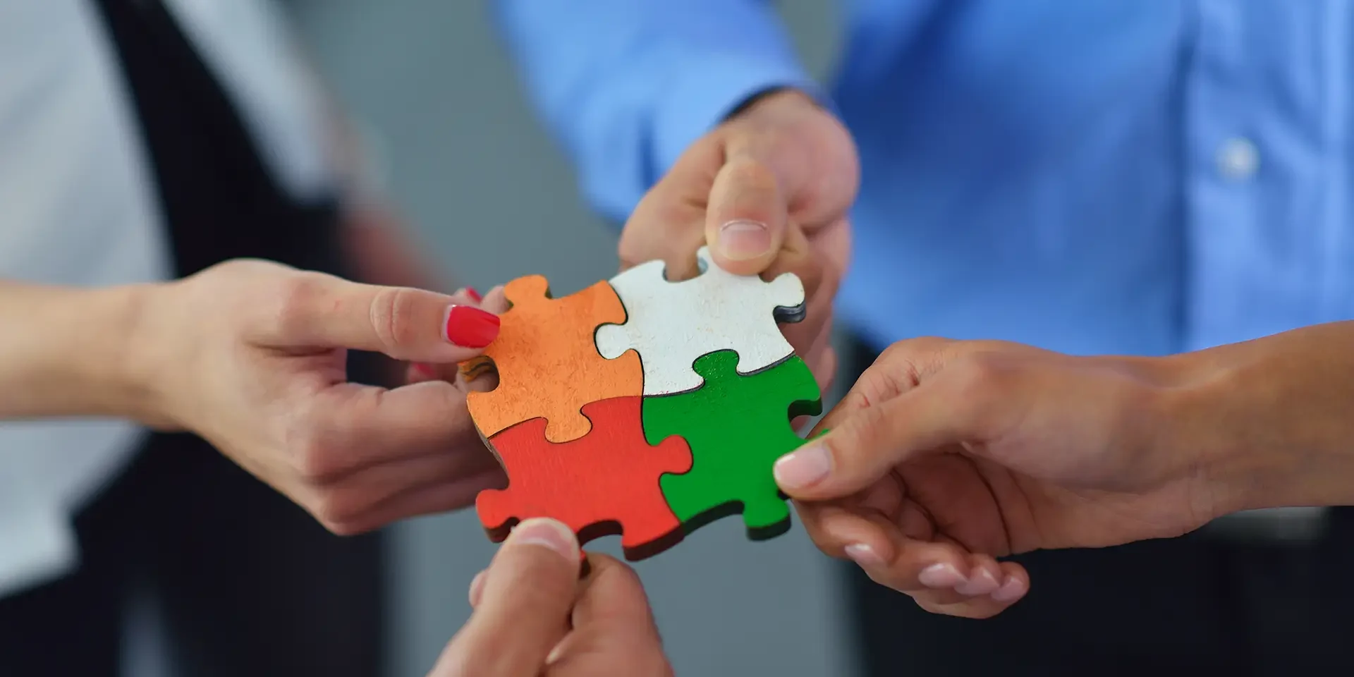 team-members-connecting-colorful-puzzle-pieces-tog-2026-04-13-23-58-56-utc